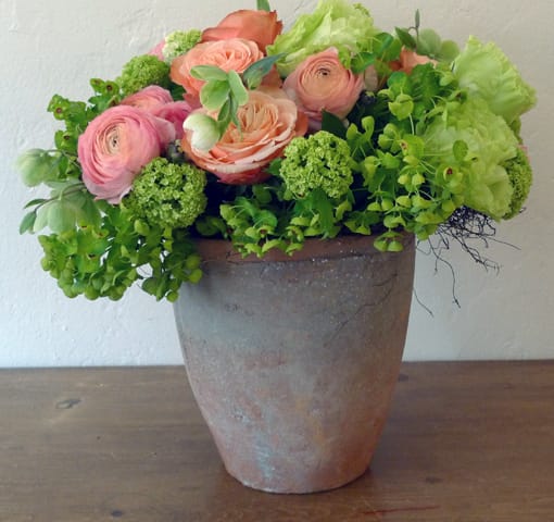 Natural Natural - Ranuculus, Euphornea, and Roses in an antique pot