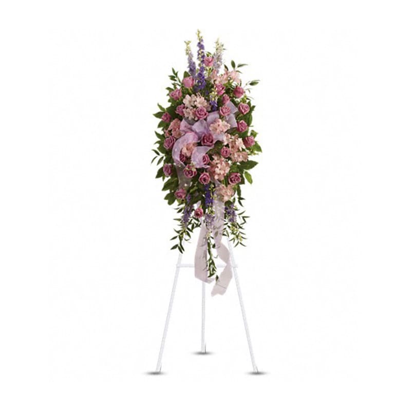 Finest Farewell Spray [T248-2A] - Utterly feminine, this spray is an extraordinarily beautiful way to bid farewell to someone who will remain forever in your heart. A bevy of lovely lavender flowers will soothe souls and deliver strength and hope to those in mourning.  Beautiful flowers such as lavender, purple and pink blossoms including roses, larkspur, alstroemeria and more are beautifully arranged. A pretty pink organza ribbon completes this fine farewell.  Approximately 22&quot; W x 50&quot; H  Orientation: One-Sided  As Shown : T248-2A