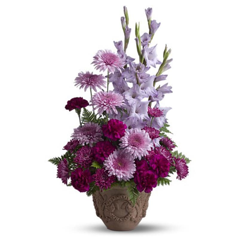 Heartfelt Memories [T221-3A] - A towering display of blooms such as gladioli, carnations and chrysanthemums in royal hues of purple and lavender, presented in a Grecian-style urn, is a gracious representation of your heartfelt sentiments at a funeral, memorial service or wake.  A mix of fresh flowers such as gladioli, carnations and cushion spray chrysanthemums, in shades of lavender and purple - accented with ferns - is delivered in a Teleflora Garlands of Grace urn.  Approximately 17 1/2&quot; W x 27 1/2&quot; H  Orientation: One-Sided  As Shown : T221-3A