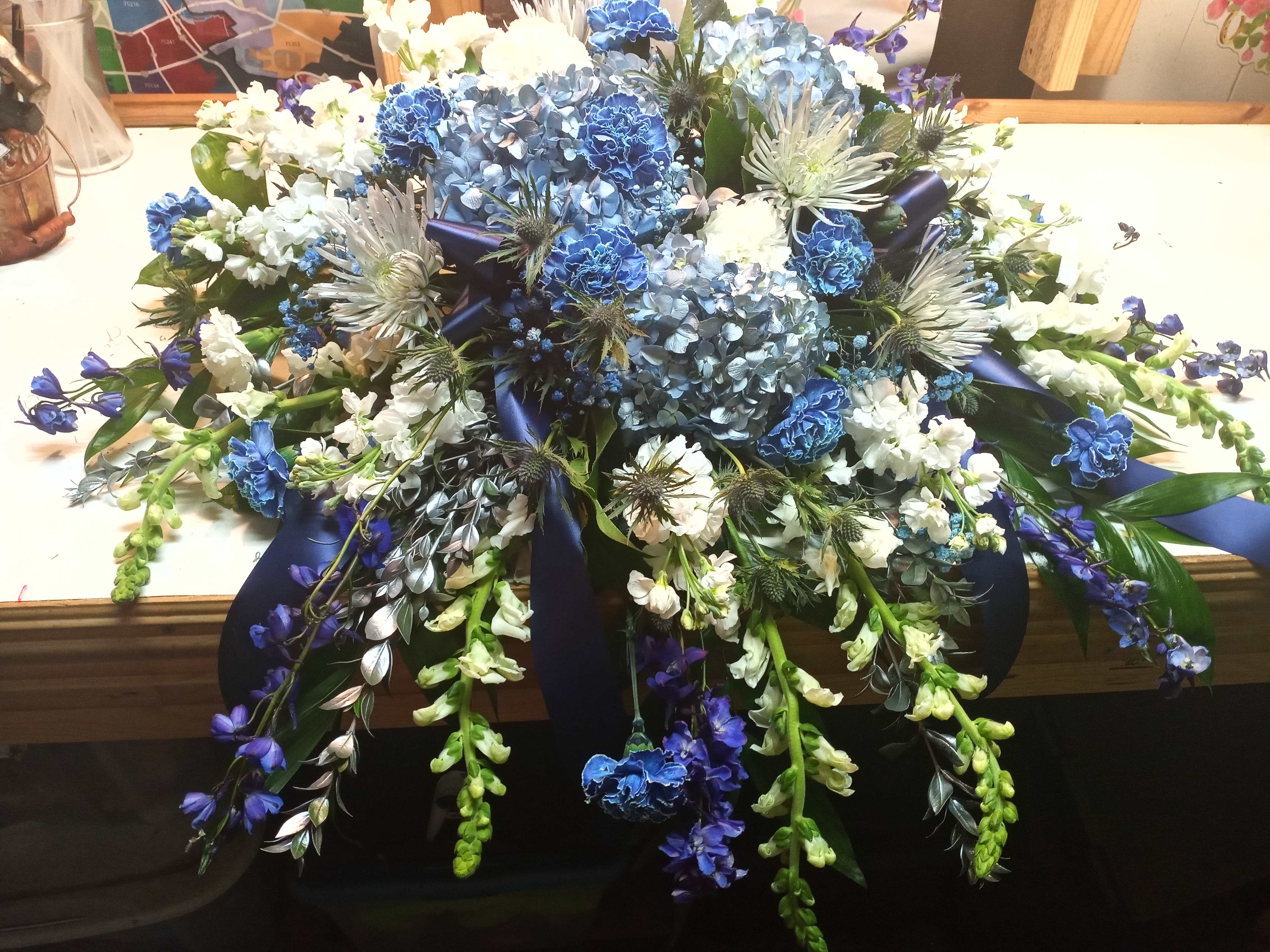 Blue Mixed Casket Cover - A variety of blue and white flowers for the top of the casket cover.  Could be used for open or closed casket.
