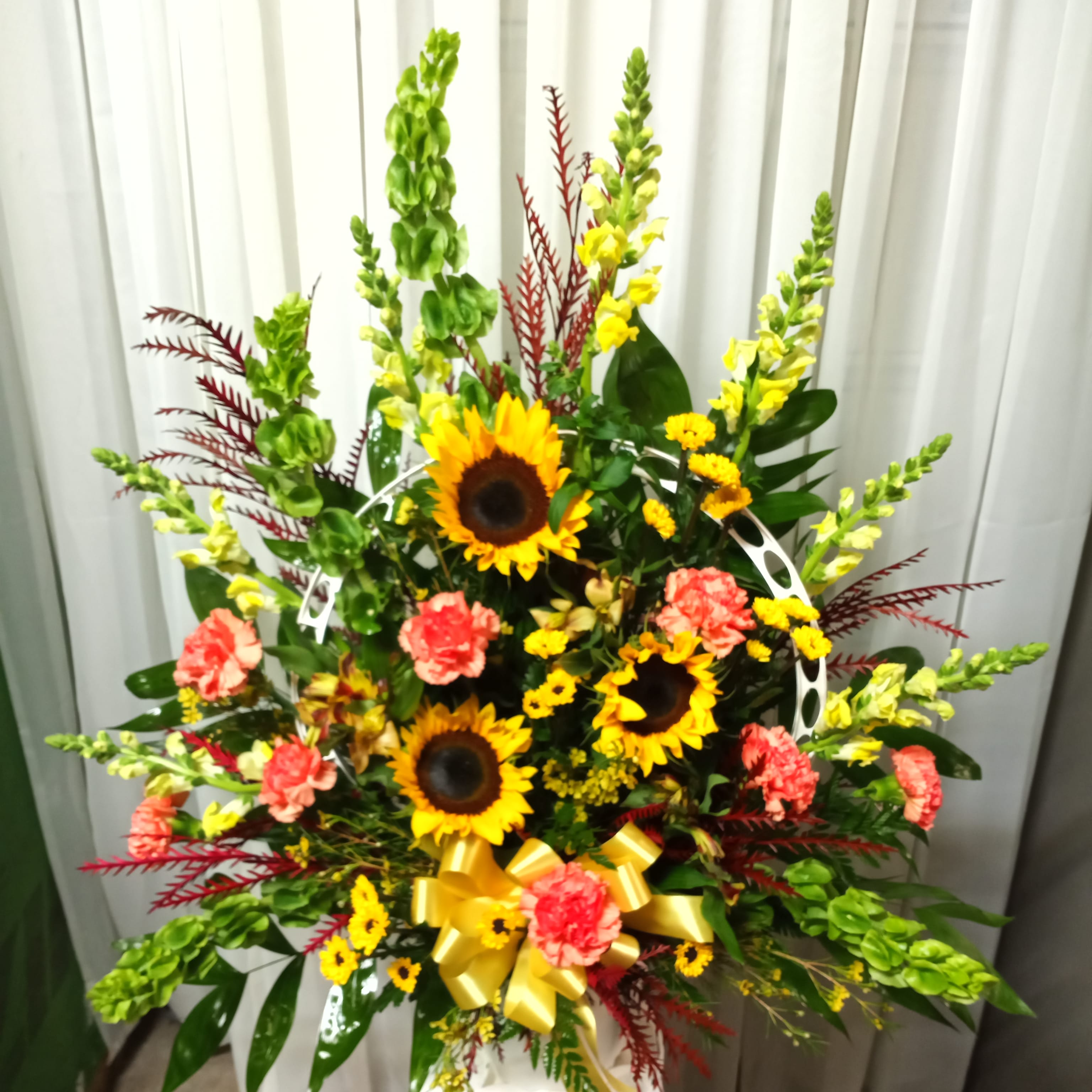 Sunflower Sympathy - Mixture of sunflowers, carnations, snapdragons and bells of Ireland for funeral services  