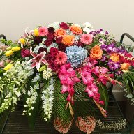 Jessica's Memory Casket Spray - Bright beautiful seasonal colored casket spray.  