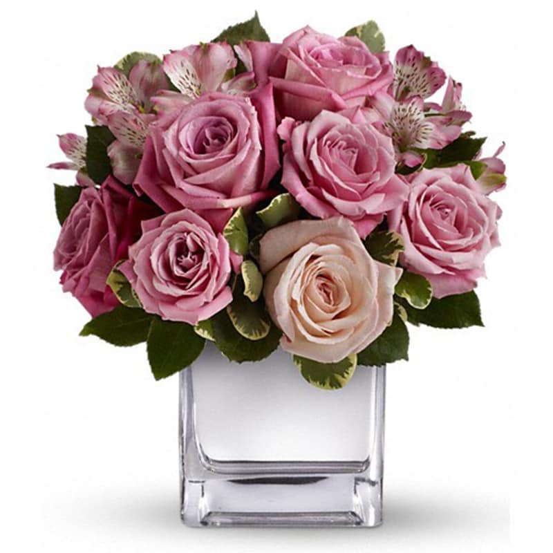 Rose Rendezvous Bouquet [T405-1A] - This tastefully terrific bouquet features soft pink and lavender roses in a sleek contemporary silver cube vase. Understated and spectacular at the same time, it is a gorgeous gift that she'll long remember.  The exquisite bouquet includes light pink roses, medium pink roses, lavender roses and pink alstroemeria accented with fresh greenery.Delivered in contemporary glass cube with a mirrored silver finish.  Approximately 10 1/2&quot; W x 11 1/2&quot; H  Orientation: One-Sided      As Shown : T405-1A