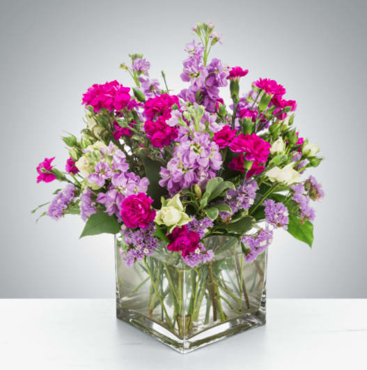 Twist and Shout by BloomNation™ Twist and Shout by BloomNation™ - Flowers are fun! Especially when they look like this! Featuring sweet-smelling stock, spray roses, and carnations, this arrangement is a great surprise for Best Friends Day, Sister Day, or just because. Approximate Dimensions: 10"D x 10"H