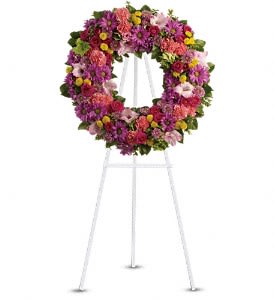 Ringed by Love Wreath Ringed by Love Wreath - The memory of brighter days is always a comfort to those in mourning. This lovely wreath will display your compassion beautifully. T239-4A