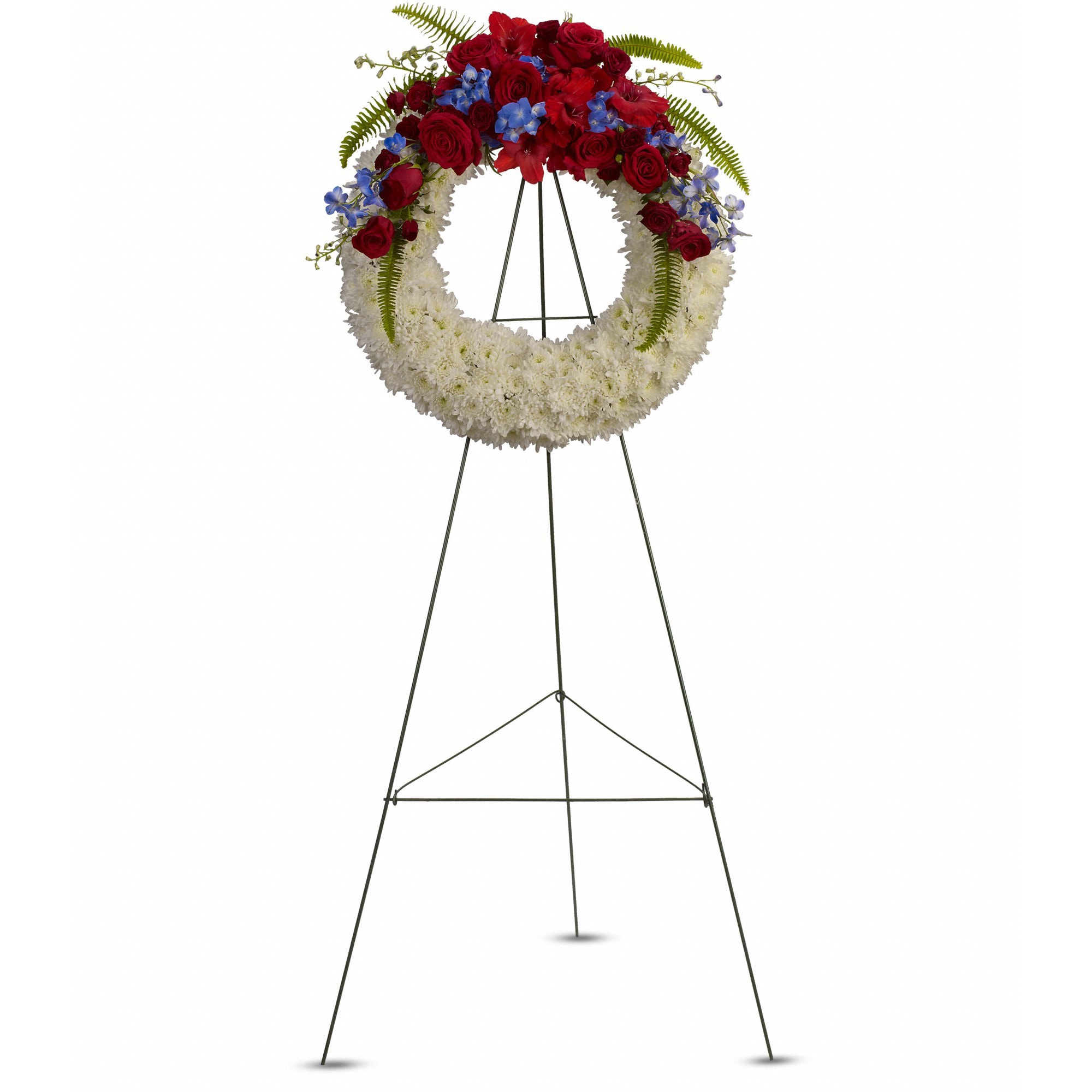 Reflections of Glory Wreath by Teleflora - A stunning display of patriotism, strength and sympathy. This red, white and blue wreath delivers a lovely message about the dignity of the deceased. 