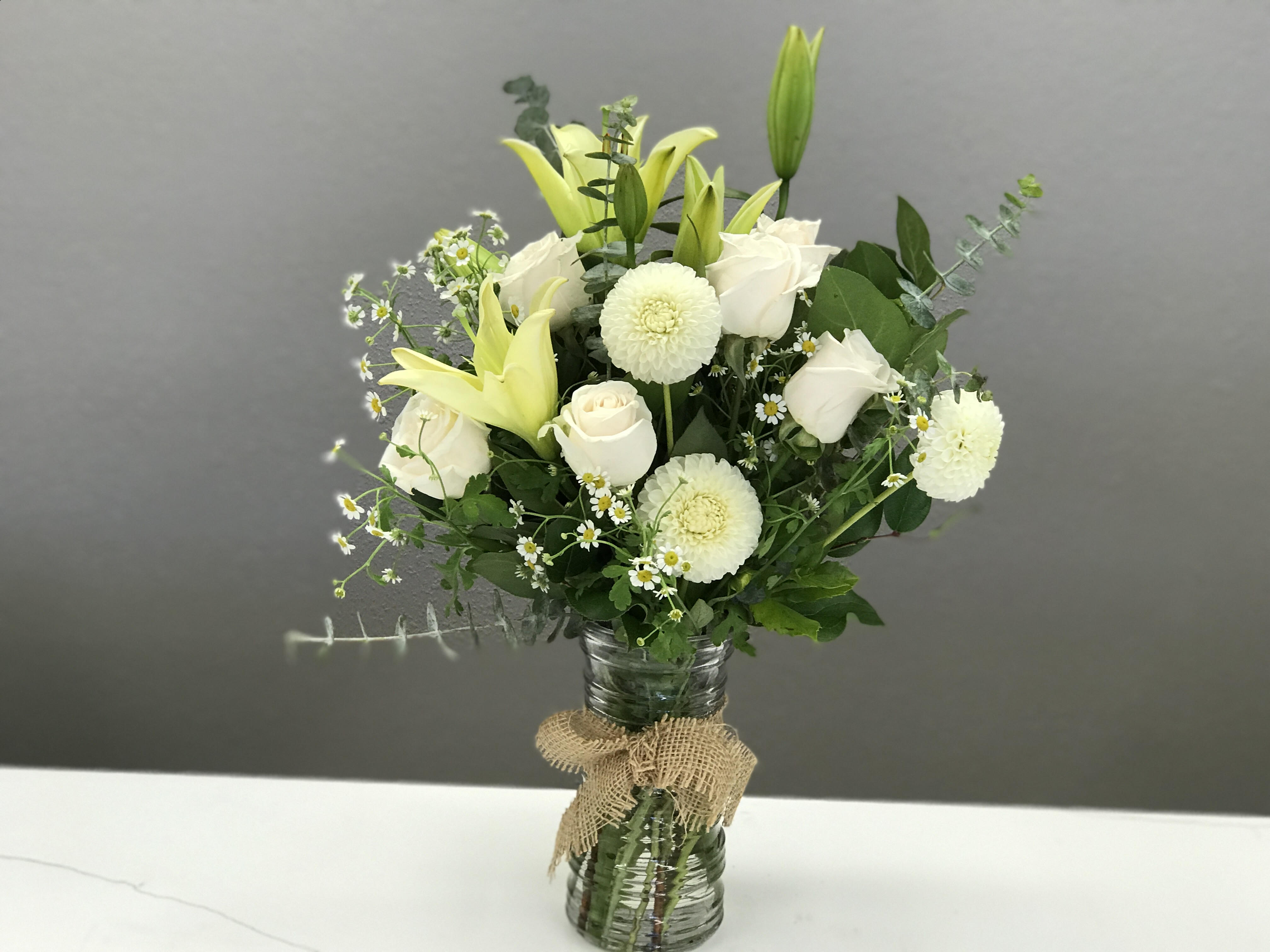 Farmer's Daughter - Blushing creams and Blushing blushes dance together in this homespun arrangement to say, Thinking of You, Darling. 