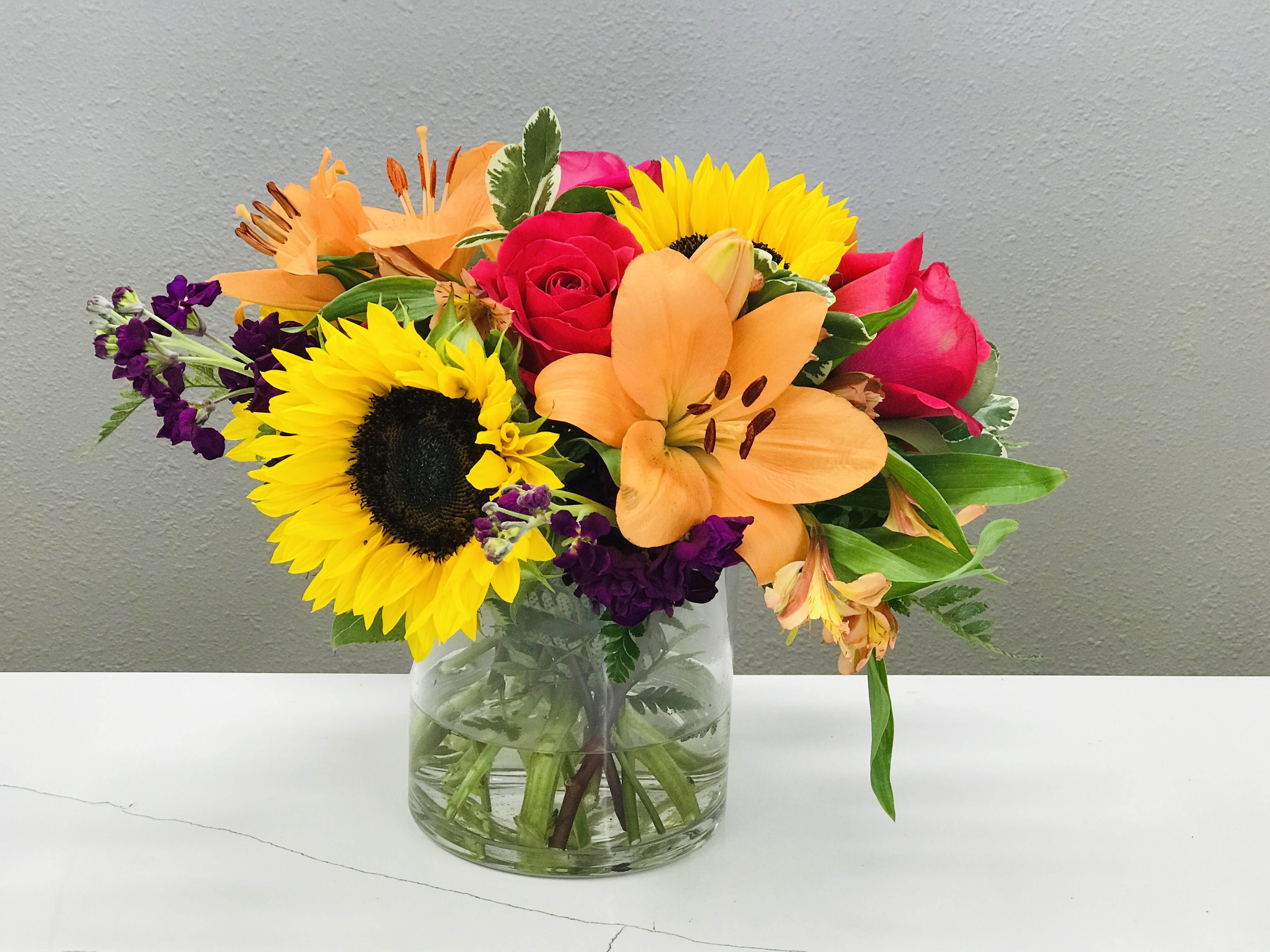 Short and Sweet - Happy happy flowers in a vibrant assortment of colors to brighten anyone's day!