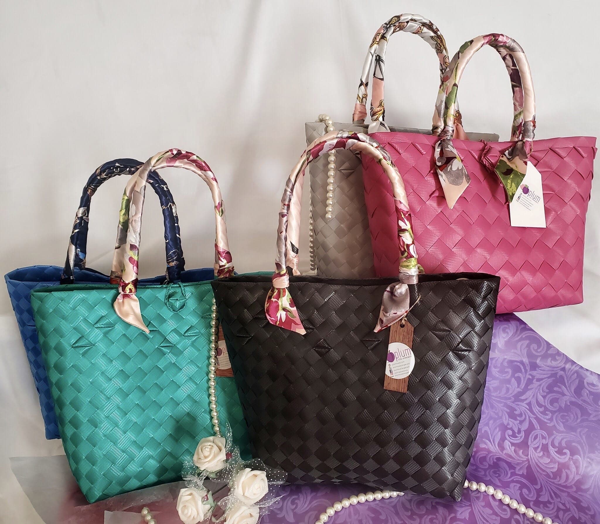 Ciaga tote bag Ciaga tote bag - A beautiful and unique gift for Loved ones. Handcrafted, handwoven straw handbag from the Philippines, with Twilly scarf handle, 14.5"x 9.5". You can add a bouquet for a custom price. colors available in black, blue, pink, green, and gray.