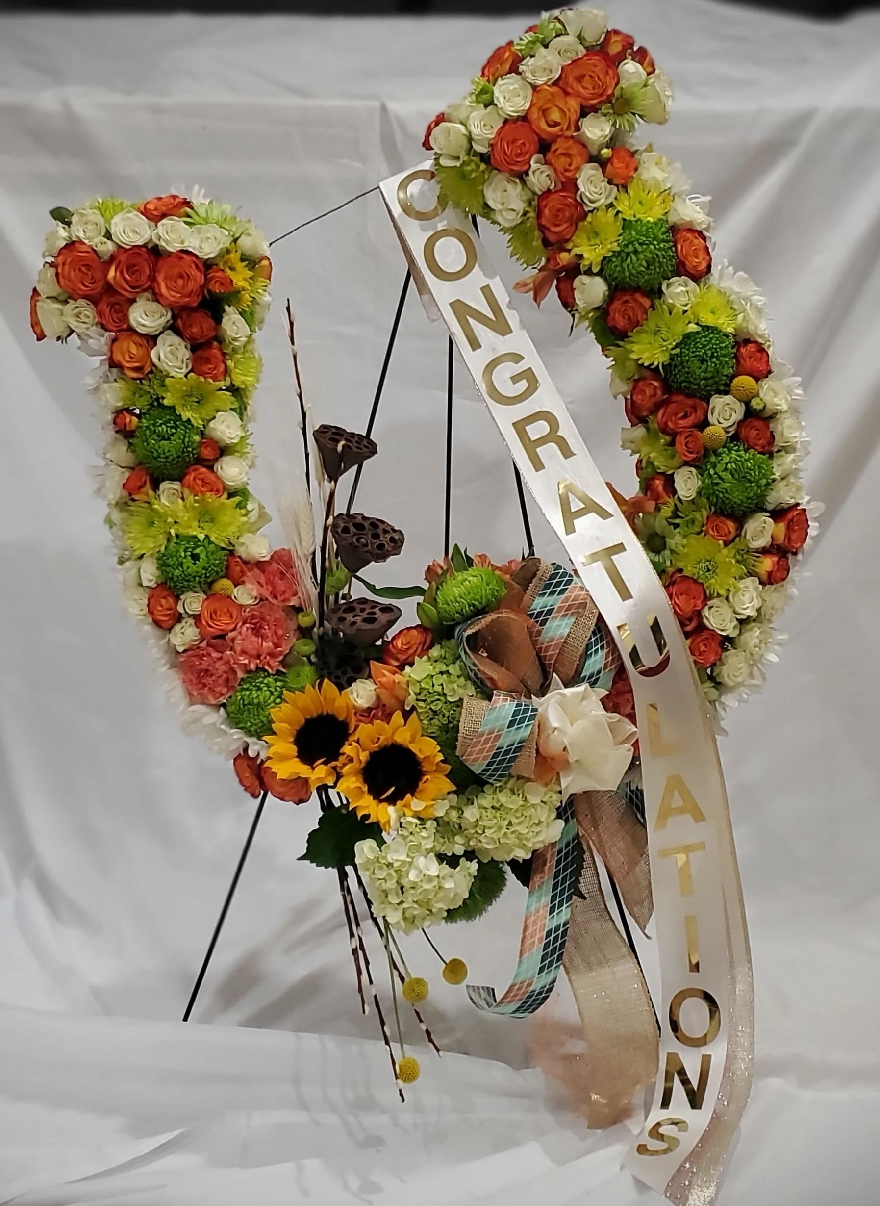 Customized Arrangement/Corp. Event, Graduation/Sympathy - Let our creative head designer create a wonderfully crafted arrangement using fresh and best-quality blooms that will show the recipient's personality and the giver's love and appreciation for that special someone. We will collaborate with you to bring out the best floral design for your beloved. 