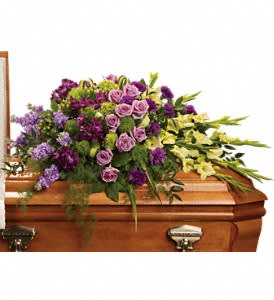 Reflections of Gratitude Reflections of Gratitude - Devotion is beautifully expressed with lavender roses, purple alstroemeria and other favorites artistically arranged and placed on top of the casket.