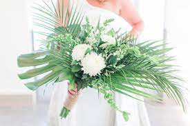 Palm Beach Wedding Package (Please Give 3 Business Days For Pick Up) - Our Palm Beach Collection captures the tropical beauty of Florida with the elegance of Palm Beach. This simple but beautiful bridal bouquet includes tropical greens white roses and white orchids. 