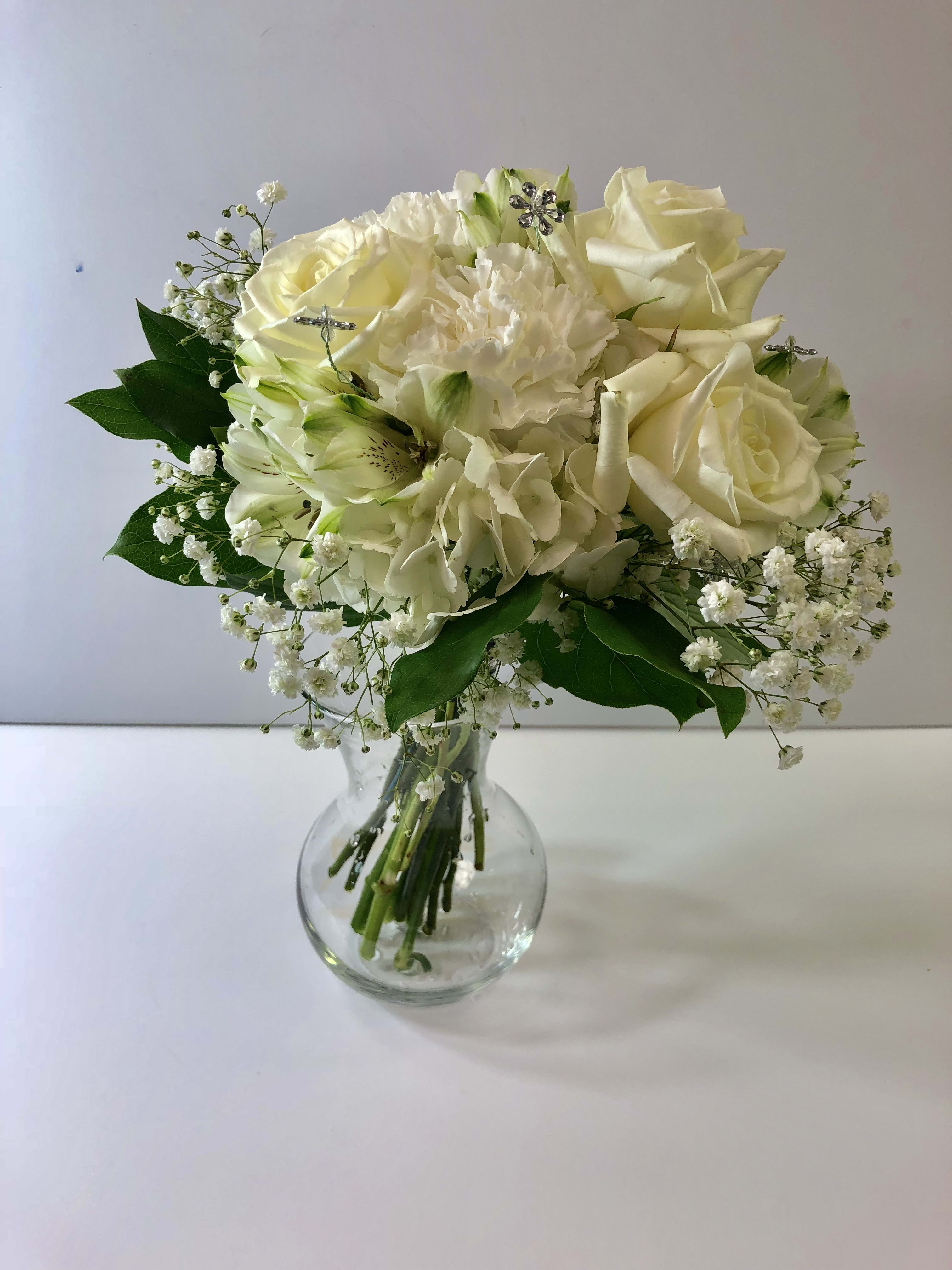 C44 Bejeweled Prom Clutch - This clutch features hydrangea, roses, carnations, astroemeria and sparkly jewels.  Each prom order is customized for you and your date's pretty dress. 