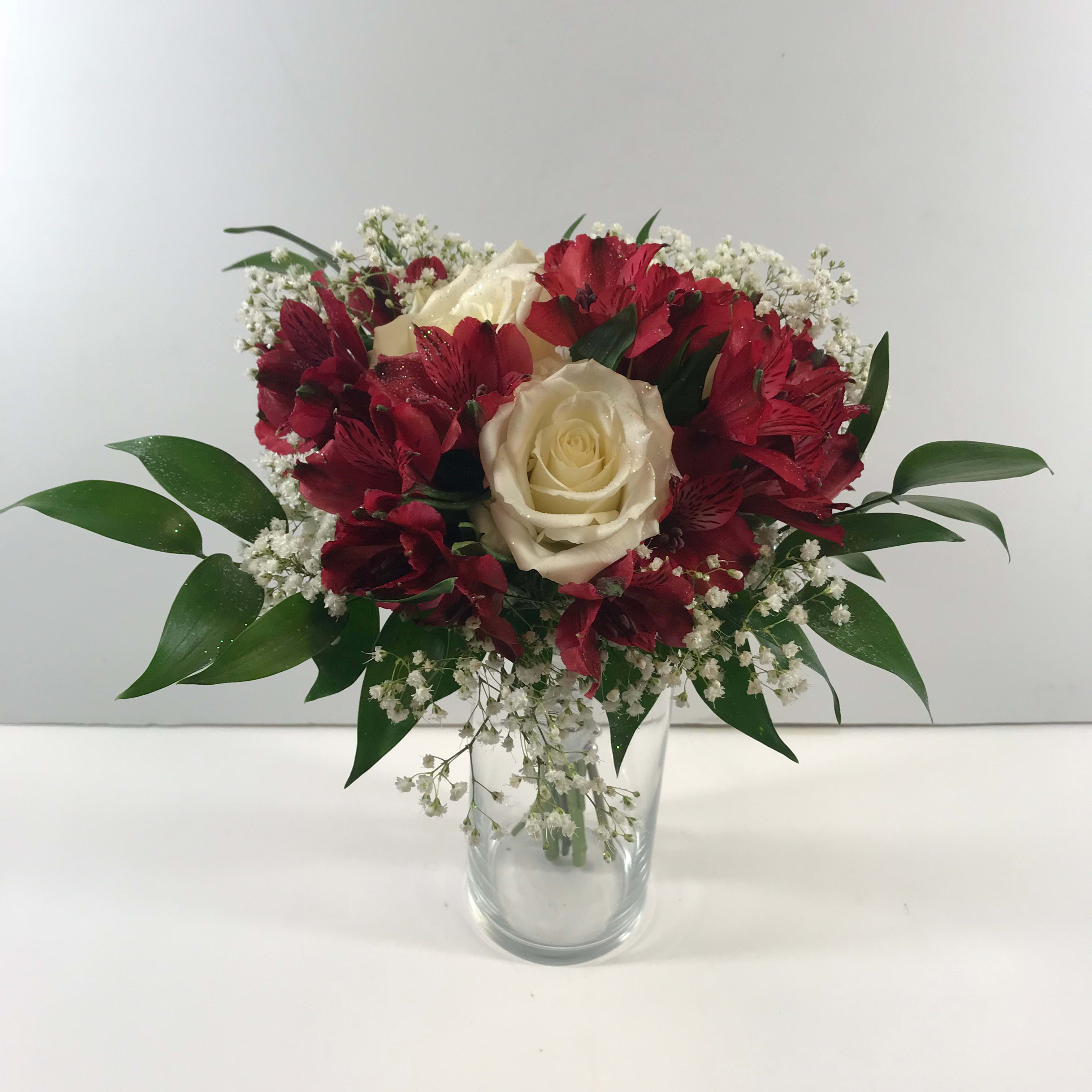 C23 Rose &amp; alstromeria Clutch  - Roses and alstromeria complete this unusual design.  The possibilities are unbelievable!  Both roses and alstromeria come in lots of colors.    We suggest you come in to order your floral accessories for your prom or dance.  Each order is customized for your date and her beautiful dress.