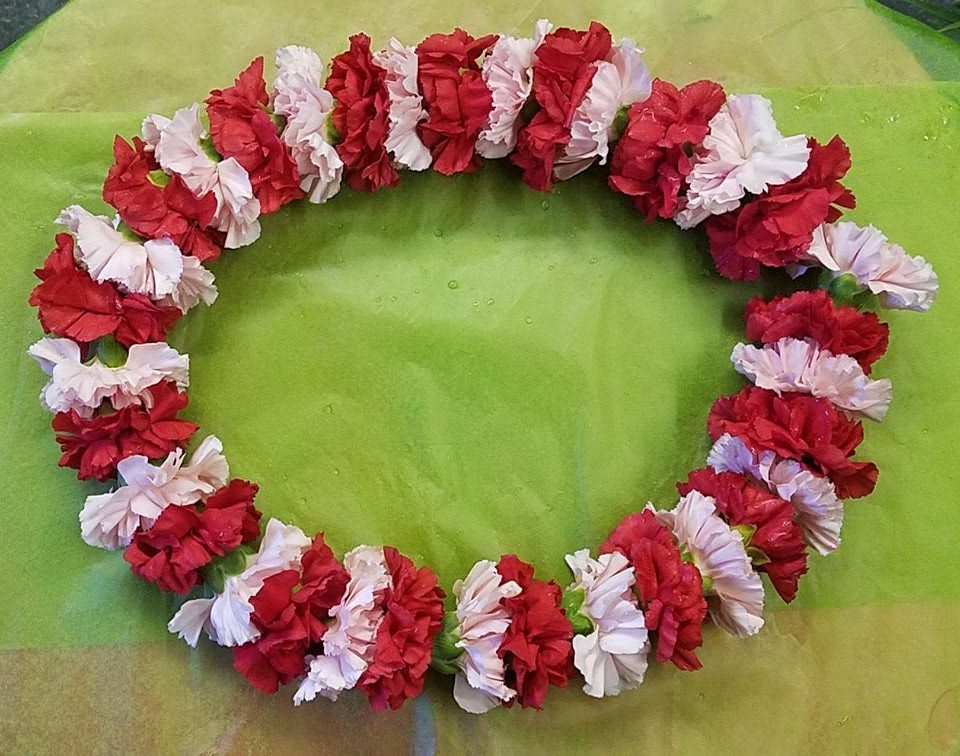 Carnation Leis - Please inquire, different colors available. 408-246-9900, available year round.