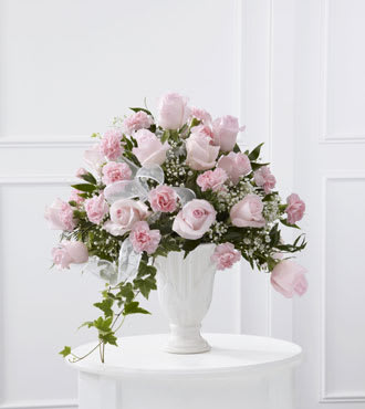 With Sympathy - Roses of your color cascading over the vase with elegance. 