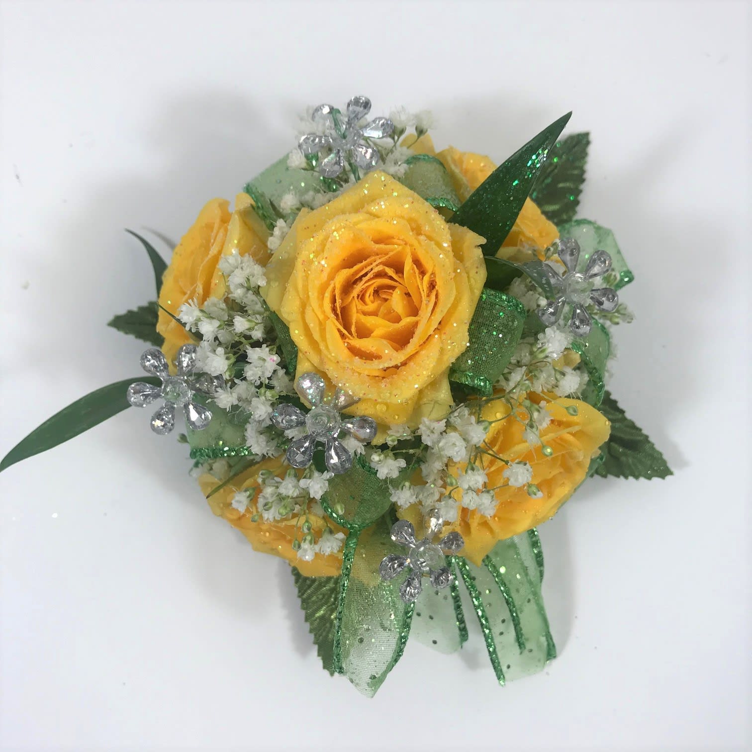 W23 Petite Father Daughter Wristlet - This petite corsage would be perfect for your young daughter.  It includes roses, pretty bow and sparkling jewels.  Each order is customized to match her beautiful dress.