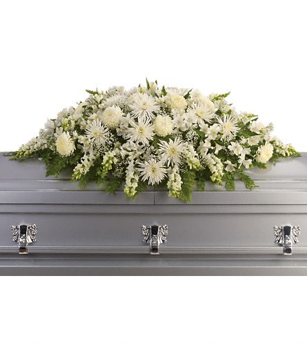 Enduring Light Casket Spray Enduring Light Casket Spray - The purity of this all-white casket spray creates an aura of serenity and peace - a beautifully memorable final farewell to a lost loved one. The elegant arrangement includes white alstroemeria white snapdragons white chrysanthemums white spider chrysanthemums and million star gypsophila accented with assorted greenery.Approximately 54" W x 23" H Orientation: N/A As Shown : T264-3A