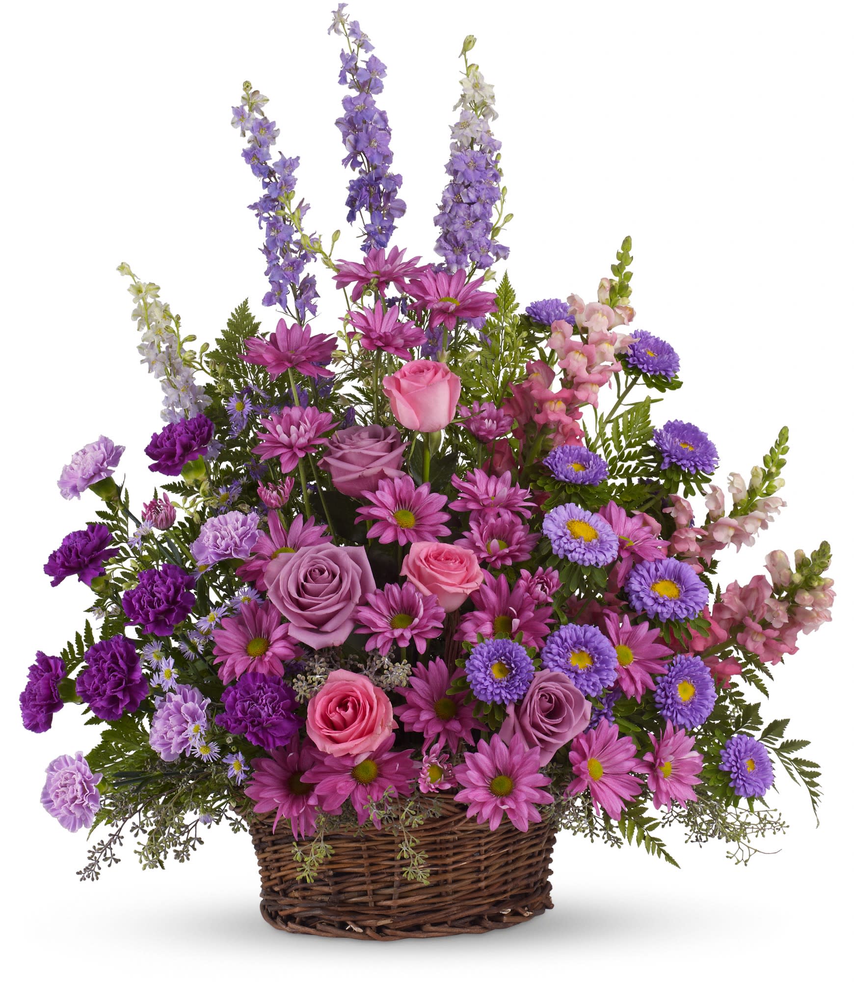 Gracious Lavender Basket (T235-1A) - Soothing lavender, respectful purple and compassionate pinks are combined beautifully in this basket overflowing with garden flowers.A lovely way to share your thoughts and pay tribute to someone special. 