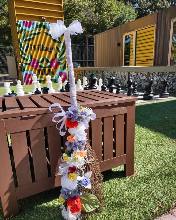 Royal Heirloom - A keepsake broom decorated with silk flowers and wrapped in ribbon for your union ceremony. A little something old and borrowed that can be passed along for future family celebrations.