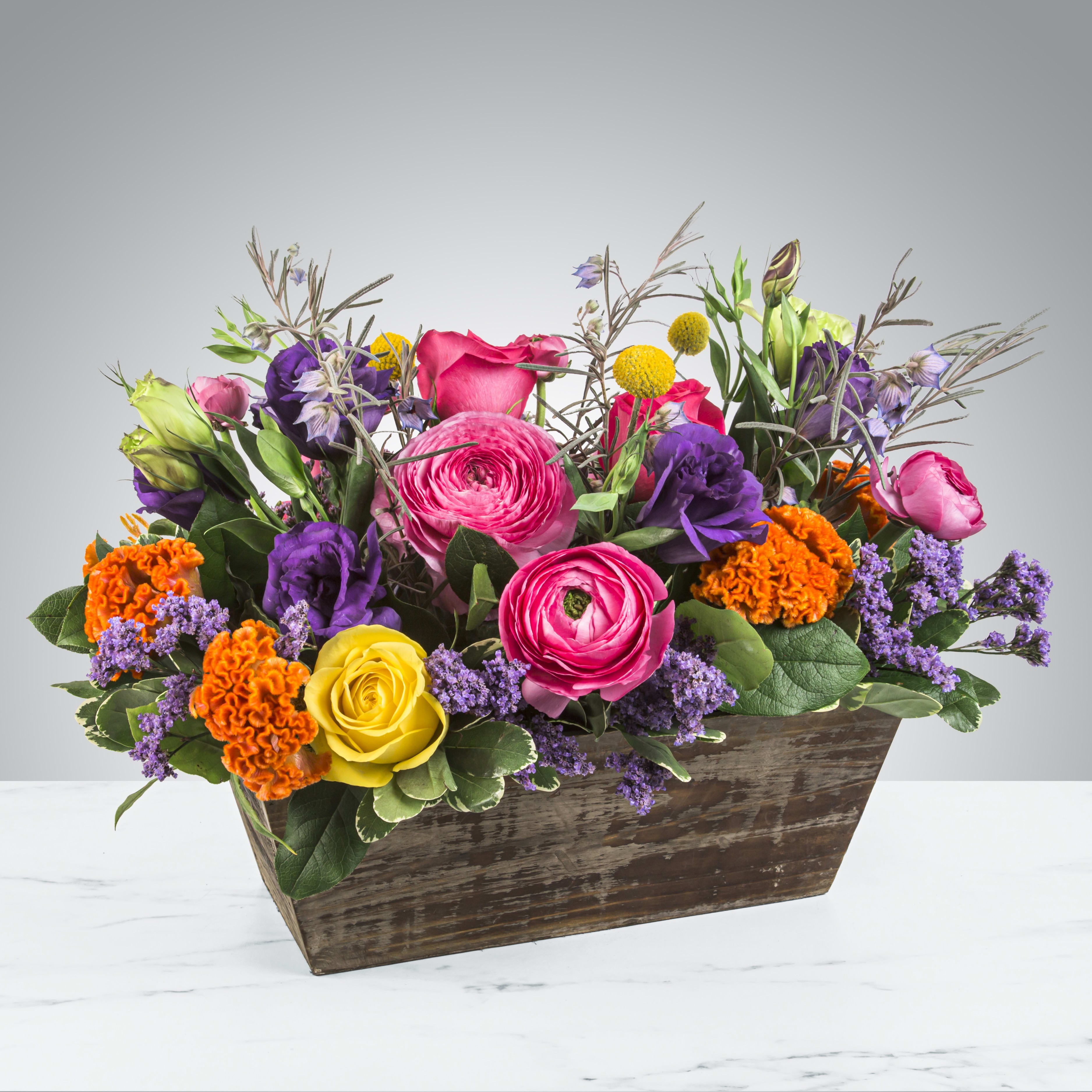 Groovy by BloomNation™ - Keep things fun with this jewel toned flower box! Ranunculus, roses, and lisianthus in a wooden garden box give this arrangement its bright colors and textures to create a beautiful centerpiece or gift.      APPROXIMATE DIMENSIONS 18&quot; W X 10&quot; H