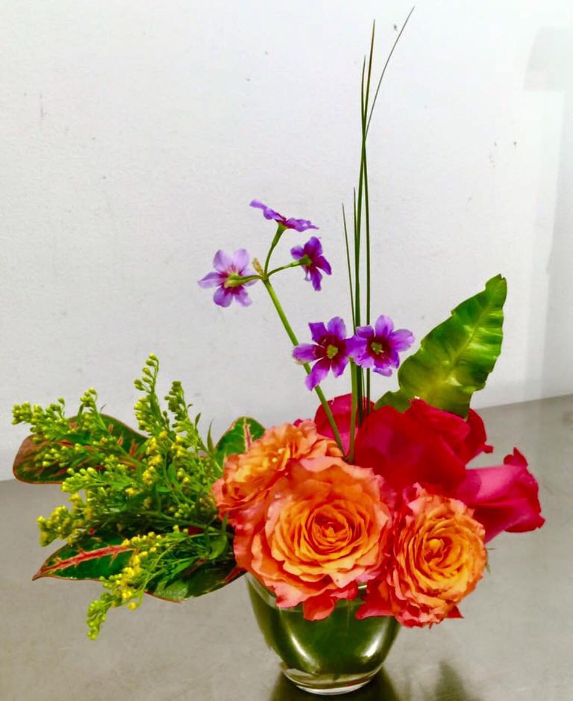 Feeling Bloomy Feeling Bloomy - Arrangement of orange, red, and purple.