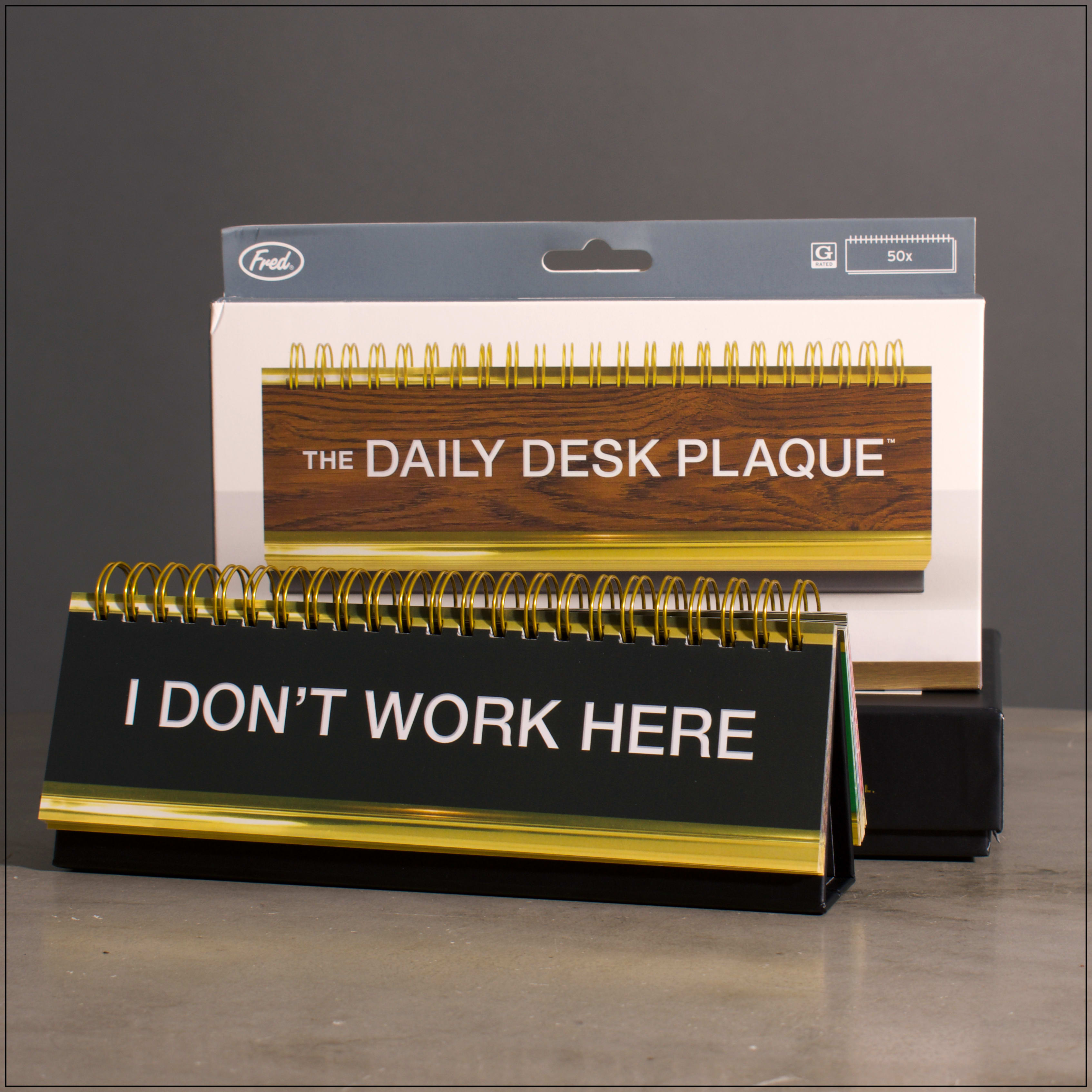 The Daily Desk Plaque - We get it. You’re kind of a big deal and want your desk to reflect that. Fred’s Daily Desk Plaque shows off your witty side and alerts your workmates about how you’re feeling. The desktop flip book contains 50 titles and phrases so there is always one to fit your vibe.