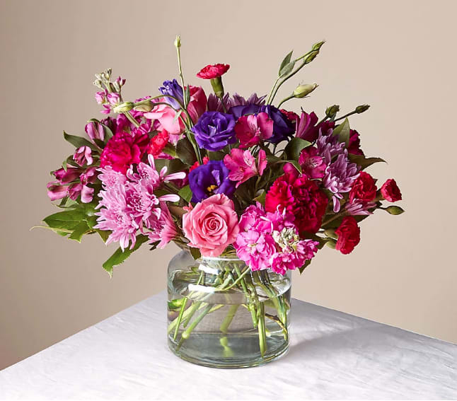 Sweet Thing Bouquet - Tell your recipient they are the Sweetest Thing with a bouquet composed of jewel–toned florals, like blooming roses, sweet alstroemeria, fragrant stock, and more.