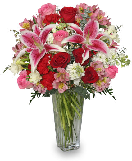 Eternally Yours - This bouquet screams 'I love you!&quot; with pink and red lilies, roses and carnations-the sweetest way to show someone you care!