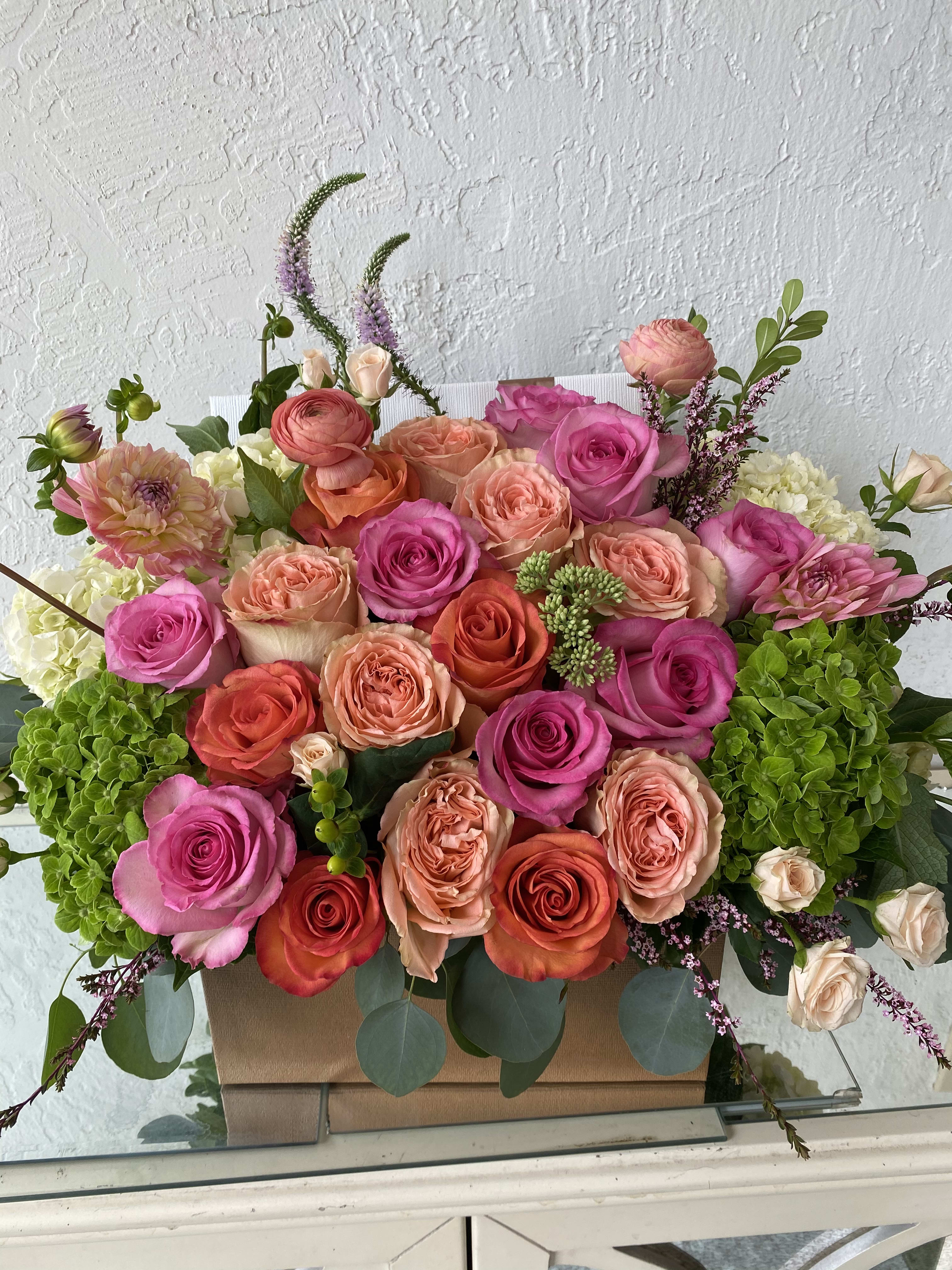 Sunburst Fiesta - Roses tulips renanculus hydrengea mix flowers