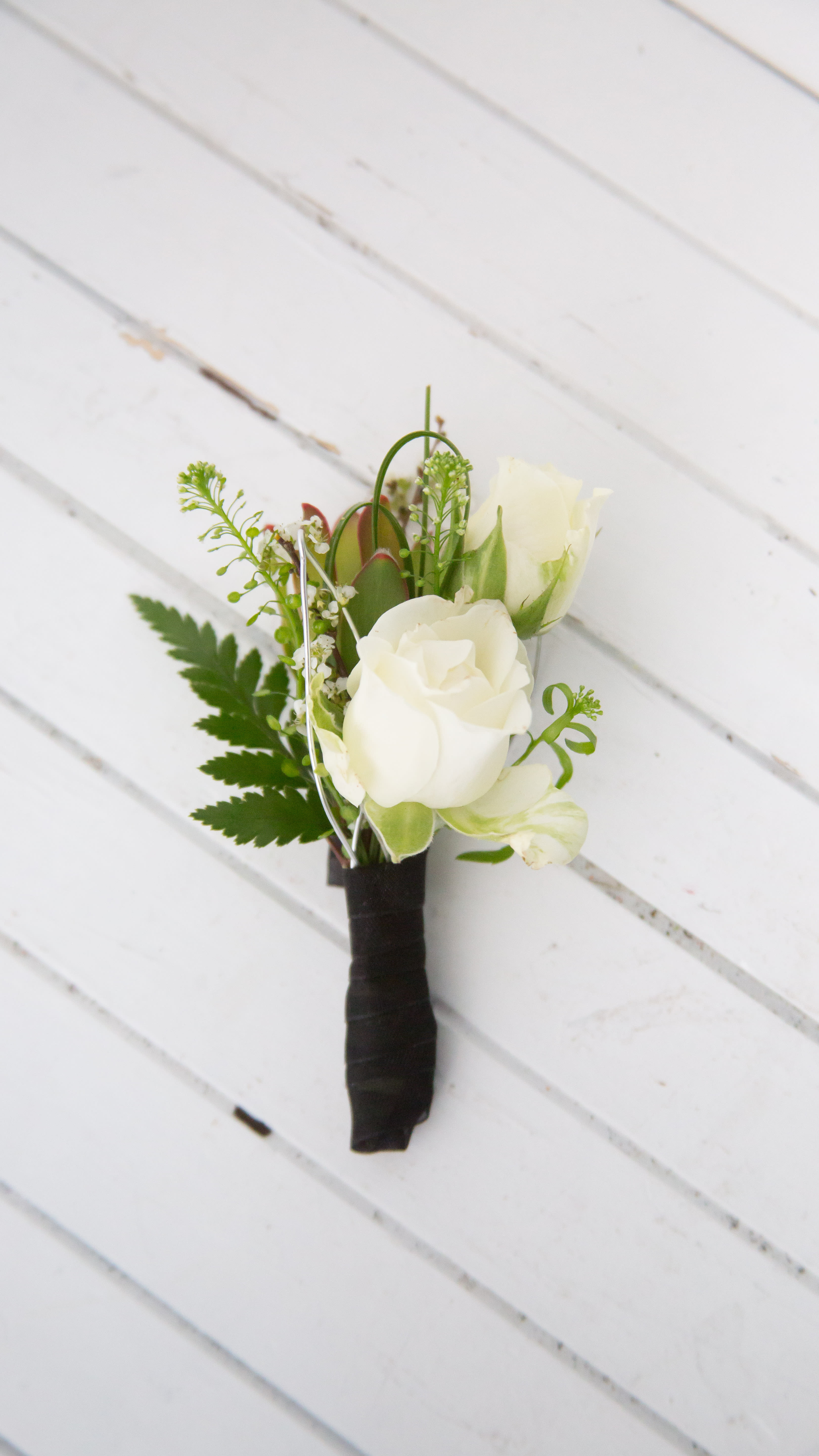 Classic Boutonniere  - Tell us the color of the suit, tie or dress and we'll do the rest! * Please note that due to the customization of colors ALL Sales are FINAL at the time of purchase. ** Flowers may vary from the photo pictured. WE ARE SOLD OUT OF WHITE SPRAY ROSES. 