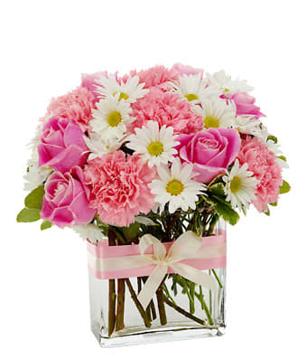 Pink'n Pretty Bouquet - You have to agree, pink and white are two colors that together generate a look of pure grace and sophistication. This floral arrangement makes the most of that look, combining white daisies, pink roses and pink carnations in a rectangle vase with...of course...a pink and white satin ribbon. * If the flower or floral container shown online is not available, a similar flower or container will be used. BF173