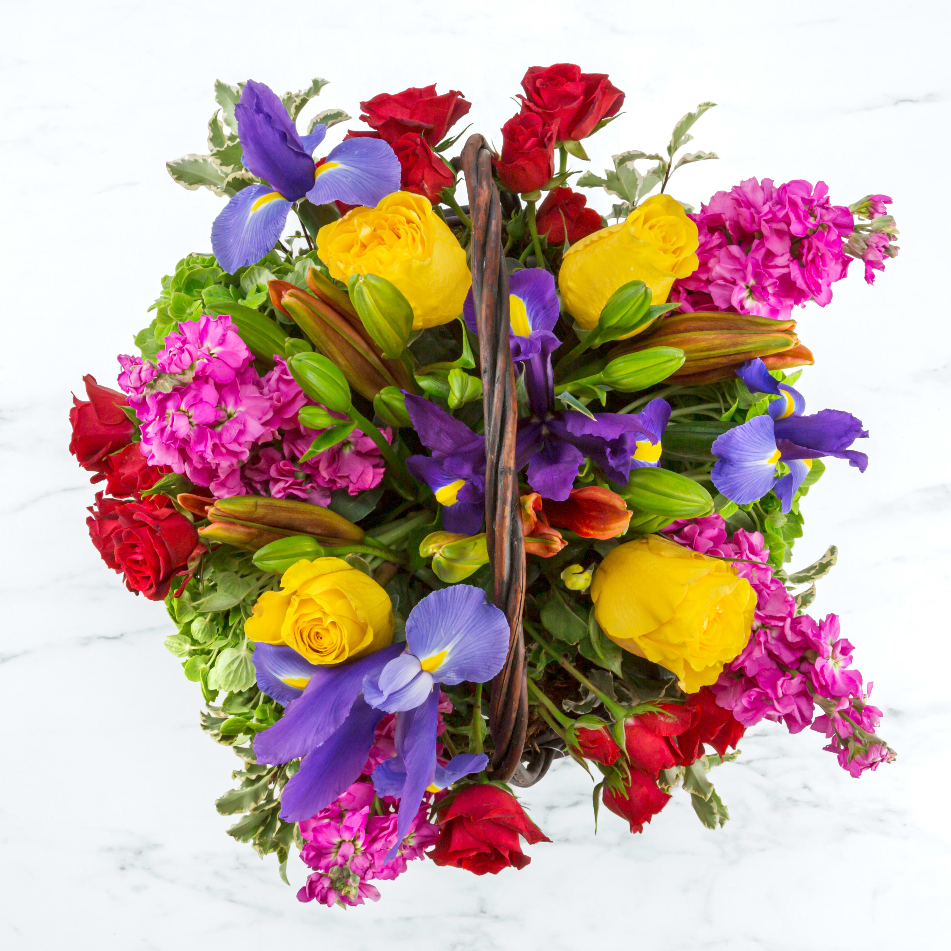 Brilliance by BloomNation™ - For the color lover in your life! Featuring 6 different types of flowers, this arrangement is a bright beauty. Send it to celebrate the summer season or for birthdays.  Approximate Dimensions: 14&quot;D x 11&quot;H