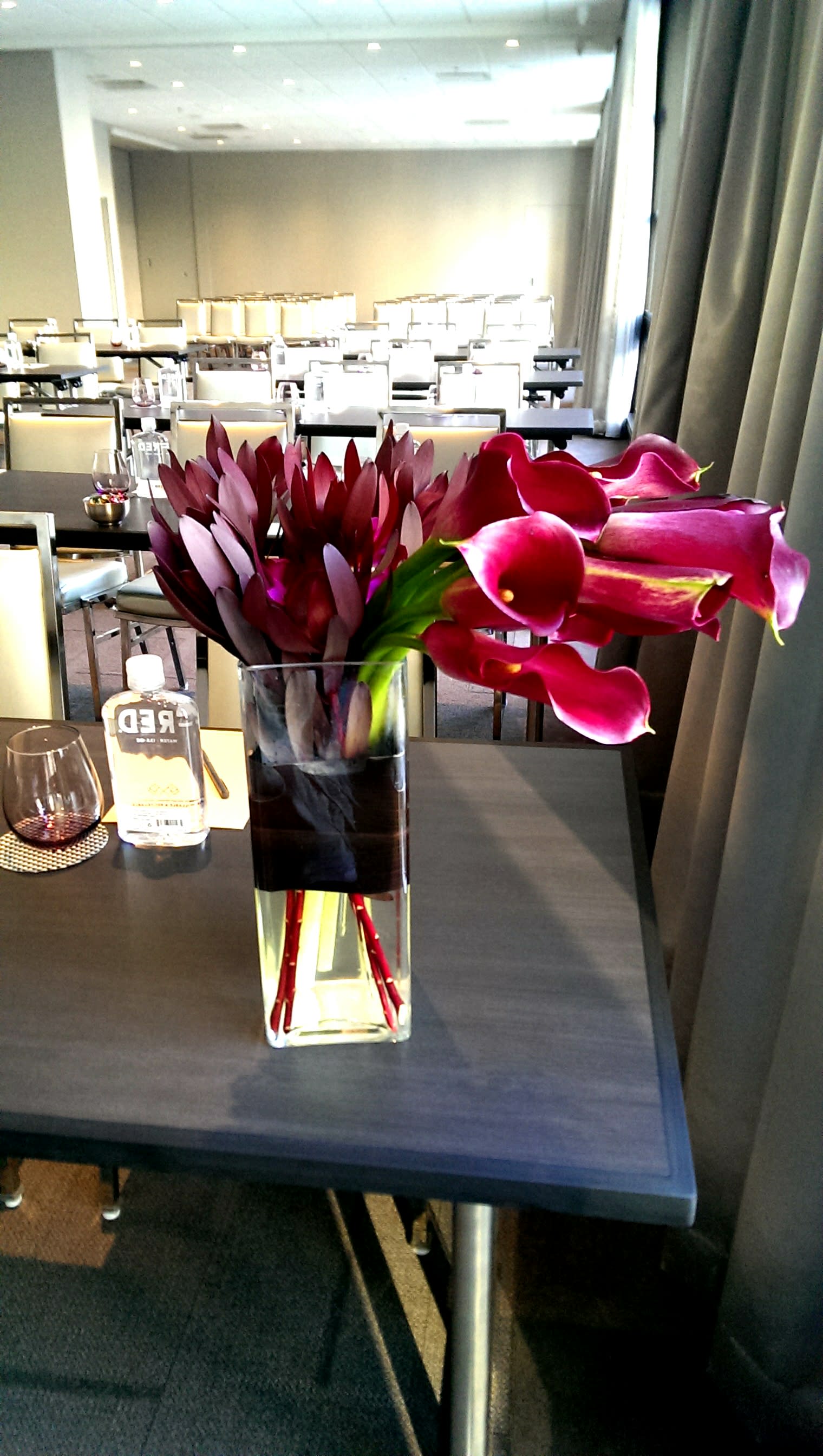 Calla Cube - Calla lilies in a tall rectangle vase.