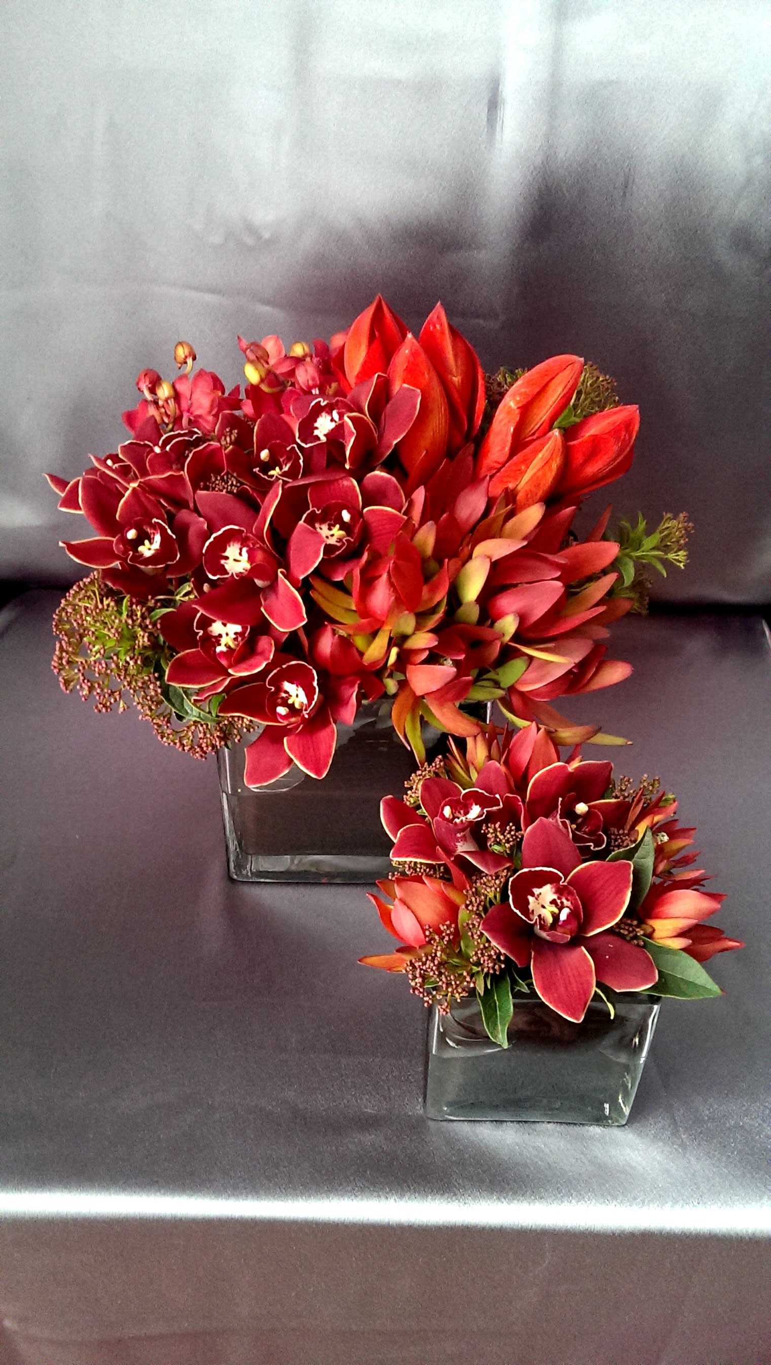 Crimson Cubes - Amaryllis, mokara &amp; mini cymbidium orchids in square glass containers. 2 pcs.
