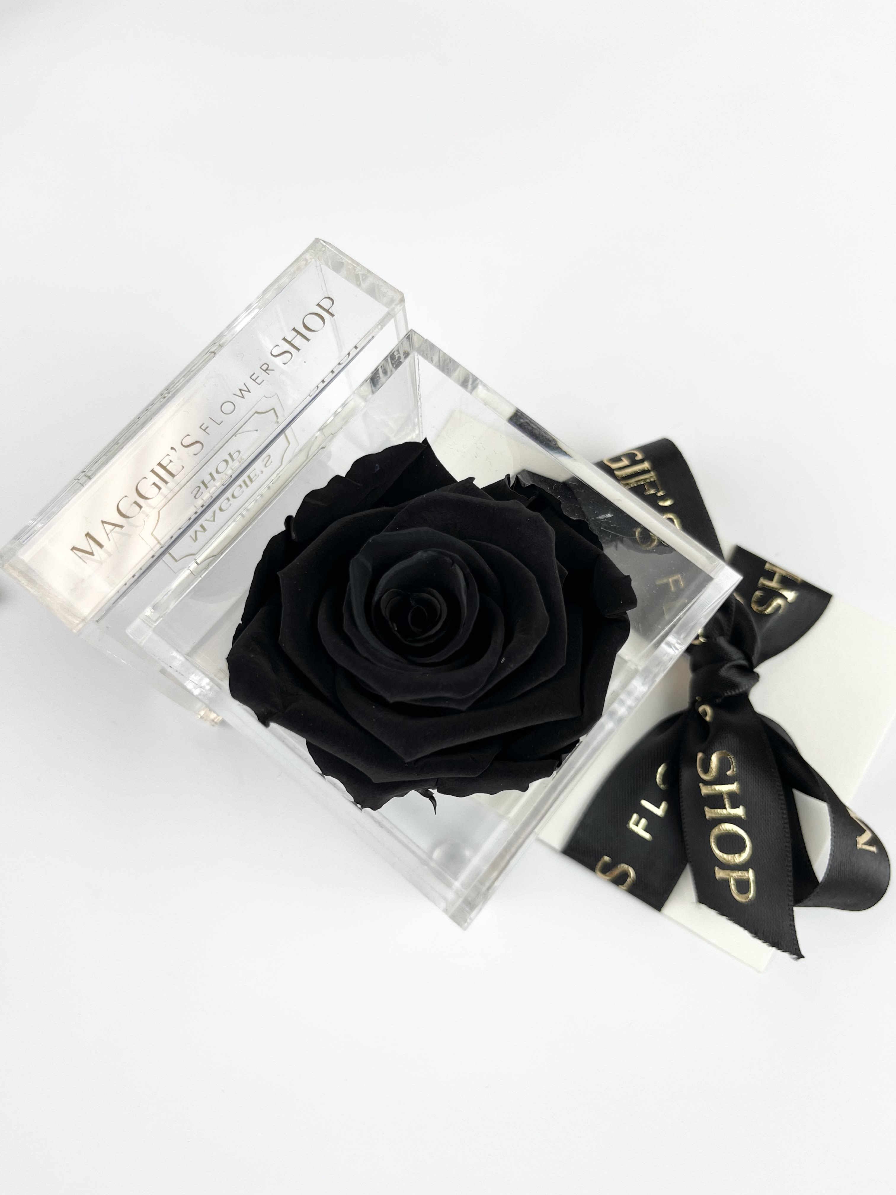 Single Velvet Black Eternity Rose (Acrylic Collection) - Eternity roses are real roses that have been preserved to last up to 3 years!    Arrangement includes : Single Scented Eternity Rose MFS custom acrylic box  