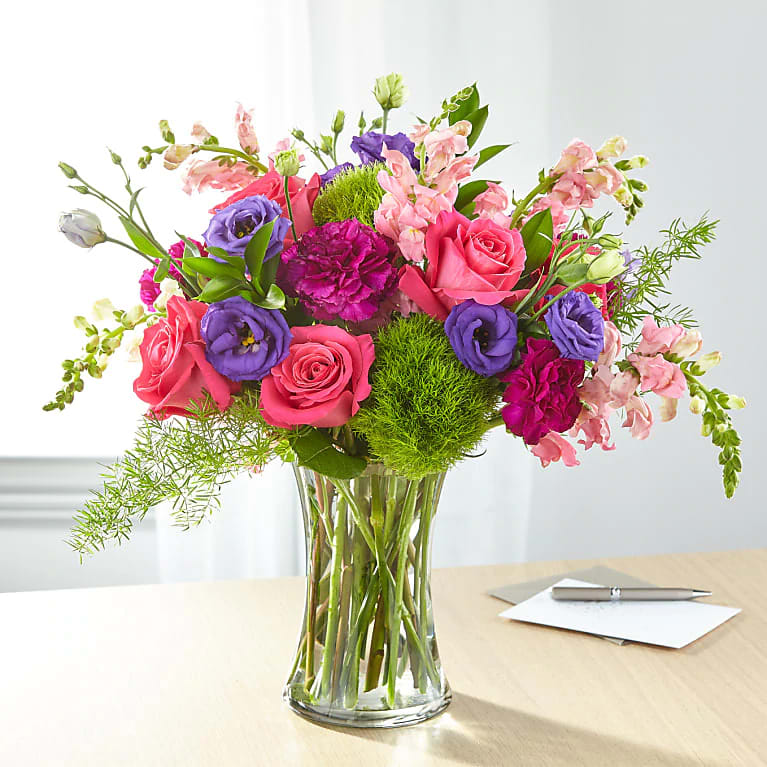 Charm & Comfort Bouquet Charm & Comfort Bouquet - CHARM & COMFORT BOUQUET Designed by florists, this bouquet evokes comfort and charm through its bright shades. Roses and snapdragons add gorgeous texture to complement the blooms in this arrangement.