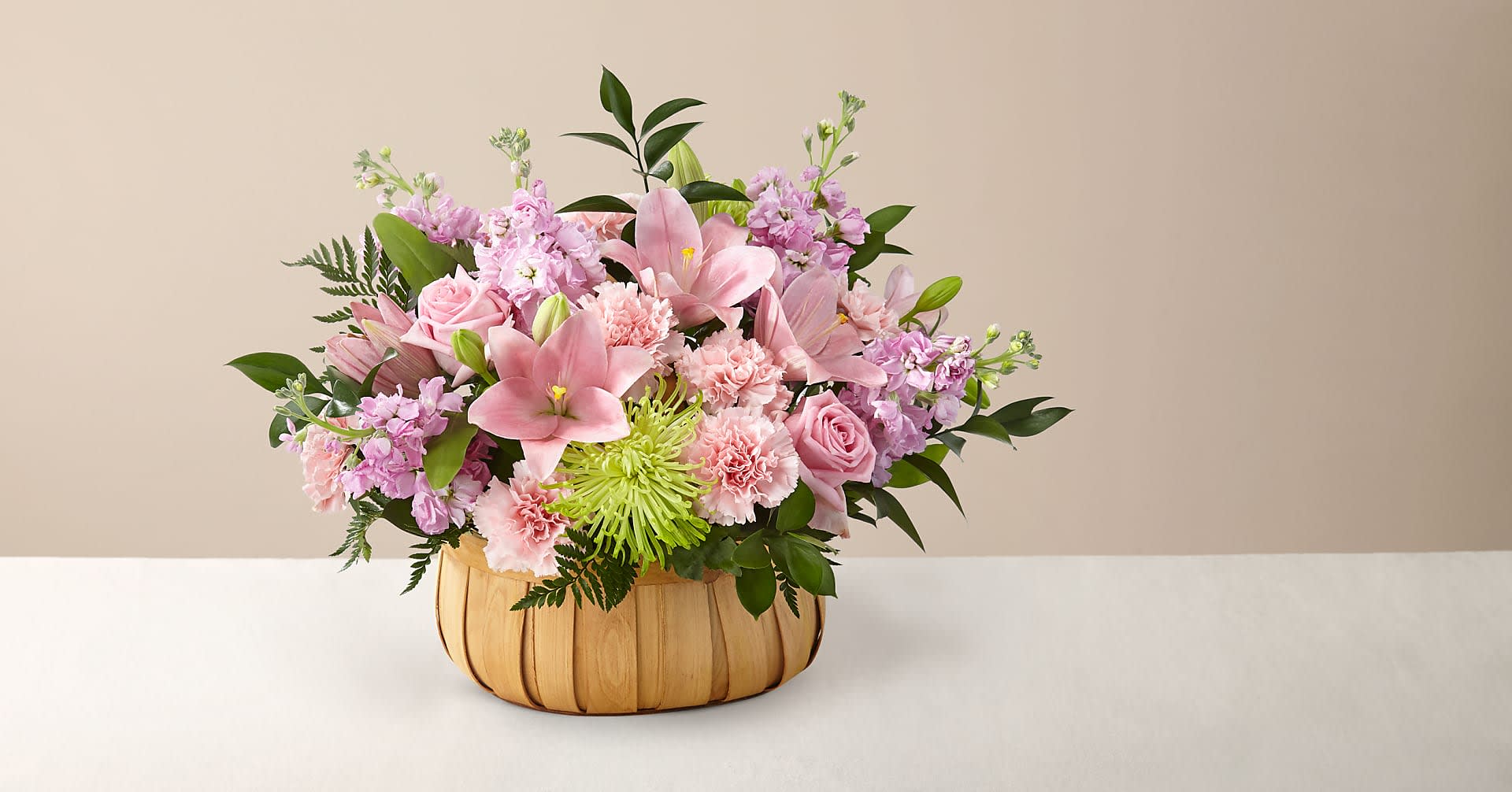 Beautiful Spirit Basket - Let them know how much you care with a gorgeous bouquet that features carnations, stock, roses, lilies and Fuji mums. Each bloom is a thoughtful reminder of your support and love, while sitting in a beautifully crafted basket.