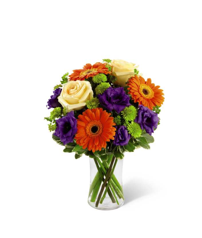  Rays of Solace Bouquet - Rays of Solace Bouquet is a cheerful burst of color to extend your deepest sympathies. CrÃ¨me de la CrÃ¨me roses, orange gerbera daisies, purple lisianthus, green button poms and a mix of vibrant greens are beautifully arranged in a clear glass gathering vase to create a warm bouquet expressing hope with every colorful bloom.