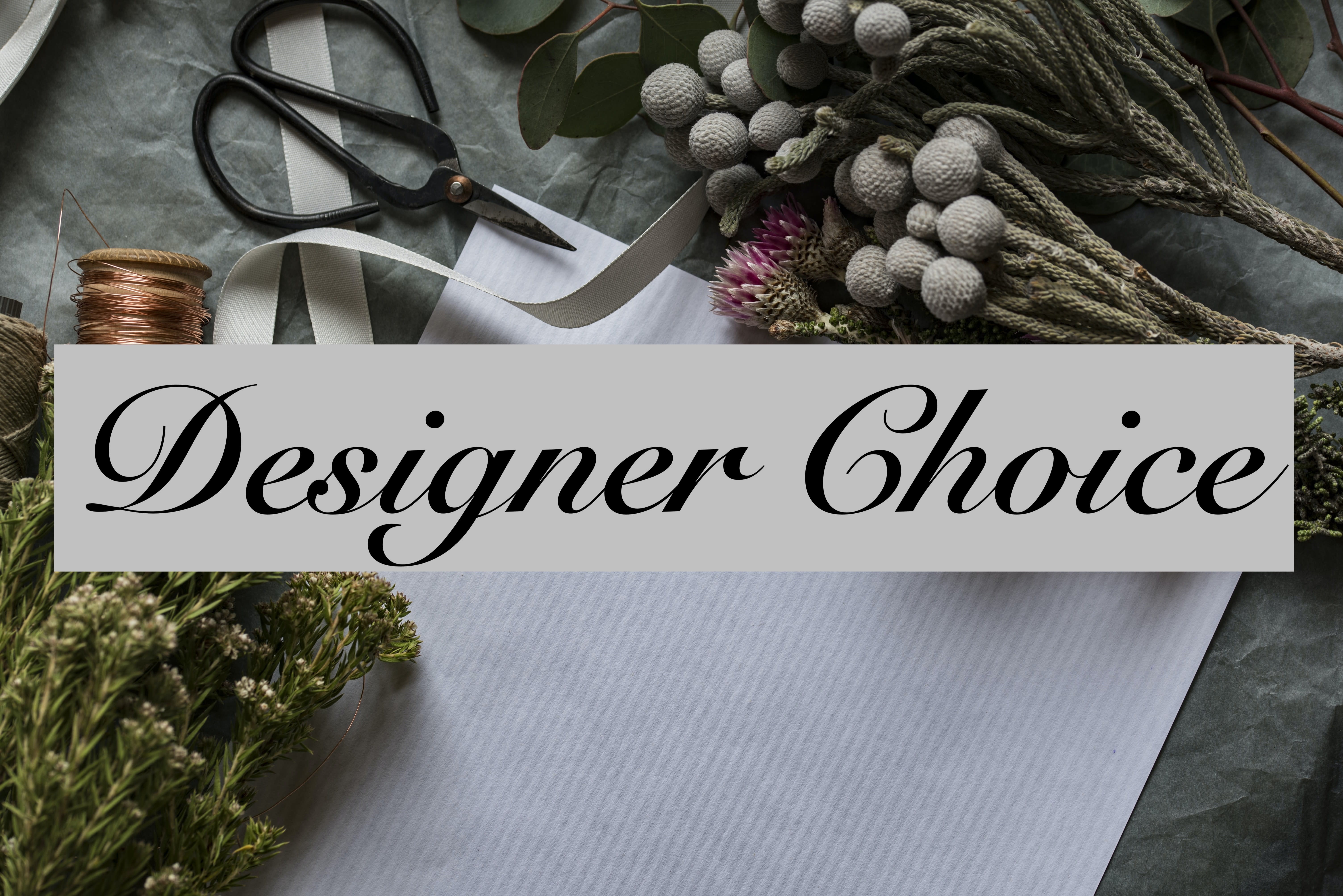 #1 Designer's Choice - Our designer's will choose the best and freshest flowers for your gift.  Let us know if you prefer and low/compact design for a home desk, coffee table or dining table or a more upright showy design.  Any other special requests from a specific flower or colors we always do our best