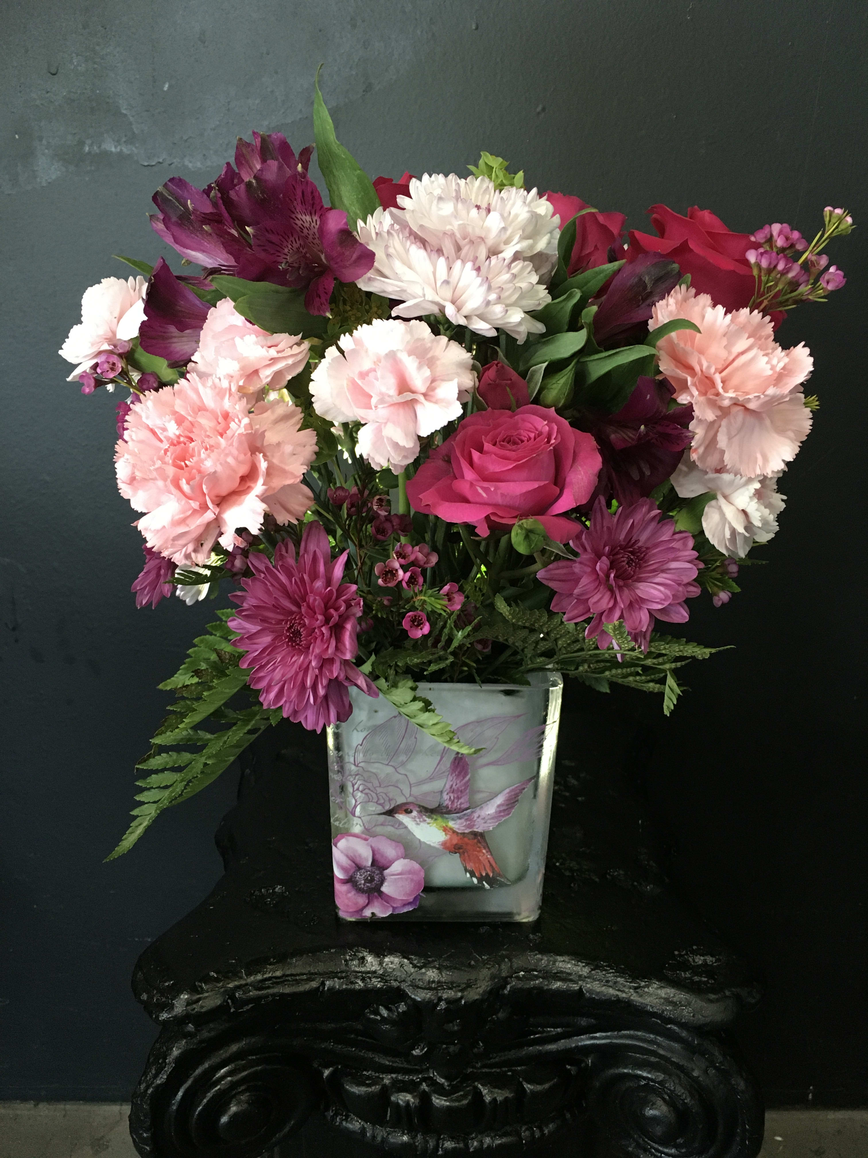 Anything For Mom - Two toned pinks with purples in a cute hummingbird cube vase
