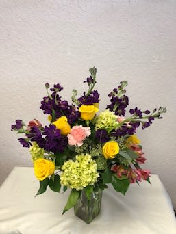 CFE113 CFE113 - Beautiful mixed arrangement of Roses, Stock, Carnations, Green Hydrangeas and Alstromeria.