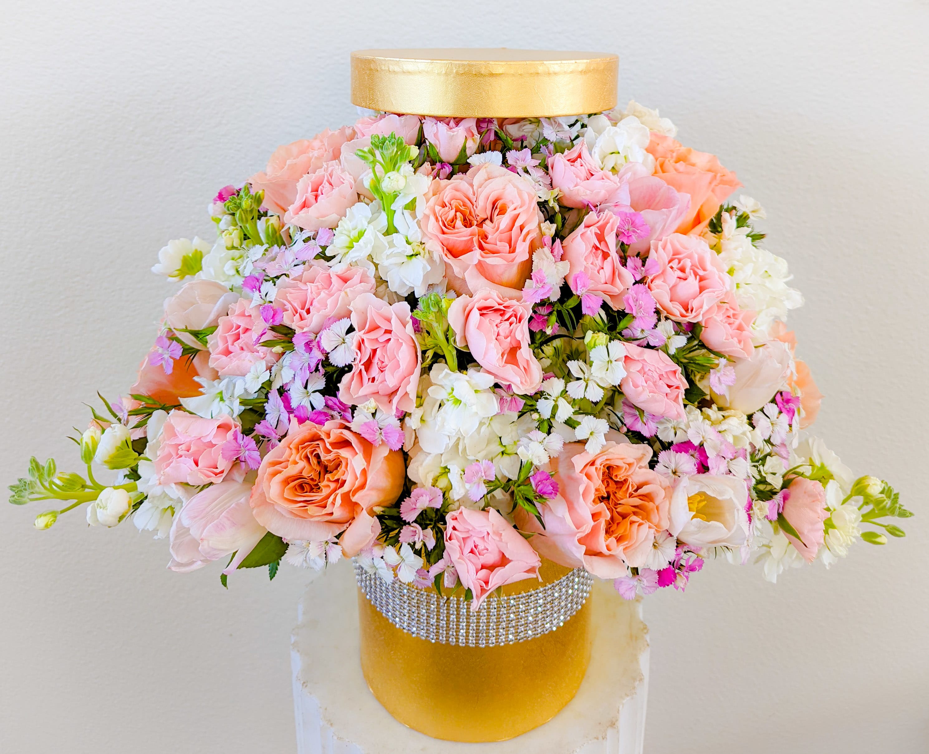Gift box with Roses and Tulips - Elegant cylinder gift box overflowing with roses and Tulips.