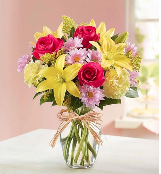 Fields of Europe for Spring Fields of Europe for Spring - Gathered with a mix of vibrant blooms inside a classic glass vase, it brings a cheerful taste of old-world charm to the people you care about. All-around arrangement with hot pink roses, yellow Asiatic lilies and carnations, lavender daisy poms; accented with assorted greenery. Our florists hand-design each arrangement, so colors, varieties and container may vary due to local availability Artistically designed in a glass vase Each arrangement is uniquely crafted by our florist using the freshest blooms available regionally. While there may be some variations from the photo shown, we’ll make sure your gift is truly special and one-of-a-kind.