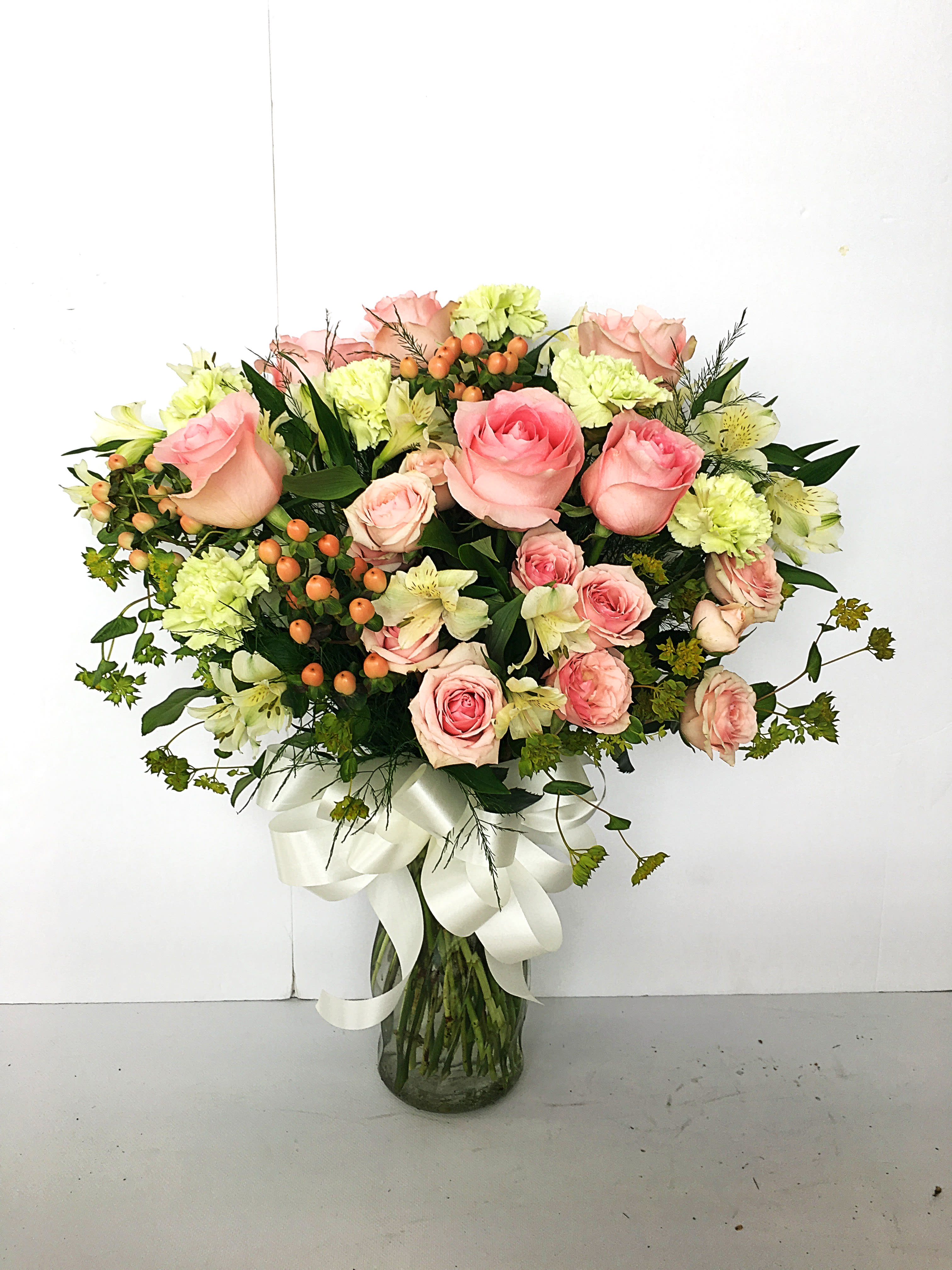Elegant Pink and Green Bouquet  - Beautiful pink roses and spray roses, white alstroemeria, brilliant green carnations, peach hypericum and fresh garden greens are perfectly hand-arranged.