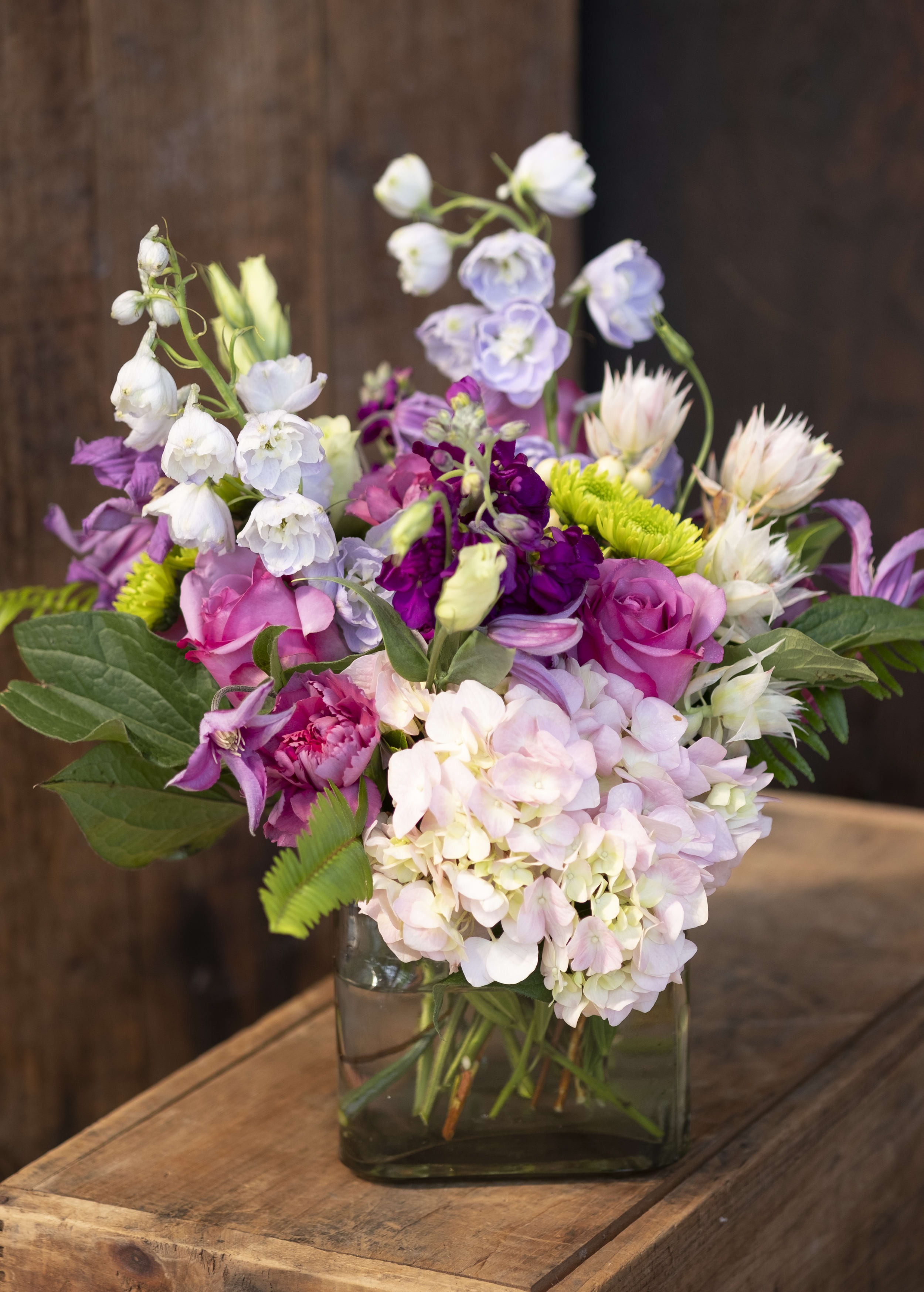 Shades of Pink in a Bowl - Our artisan handmade arrangement's overall theme is different shades of pink. The actual bouquet or arrangement may not precisely match the photo,but its temperament will. The freshest, artisan flowers available are used to create an exquisite arrangement especially for you. We also use a variety of unusual greenery for an example eucalyptus, salal (lemon leaf), pittisporum. Occasionally, substitutions of flowers or containers happen due to weather, seasonality and market conditions which may affect availability. If this is the case with the gift you've selected,we will ensure that the style, theme and color scheme of your arrangement is preserved and will only substitute items of equal or higher value.