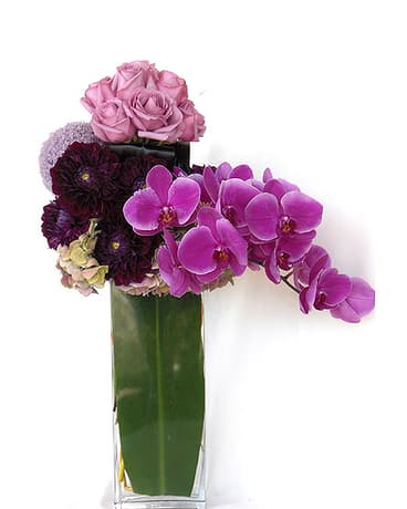 Unforgettable Unforgettable - Amazing, tall and beautiful bouquet, of lavender roses, burgundy dahlias, purple alium, antique hydrangea, and the elegance of cascading purple phalaenopsis orchids. An unforgettable gift for a birthday, anniversary or anyone you want to impress. Product ID: DF-1465