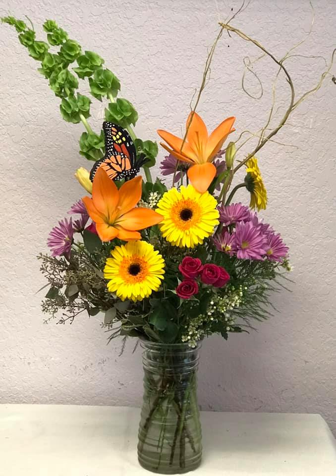 CFE117 CFE117 - Mixed Arrangement of Asiatic Lilies, Gerber Daises, and Spray Roses.