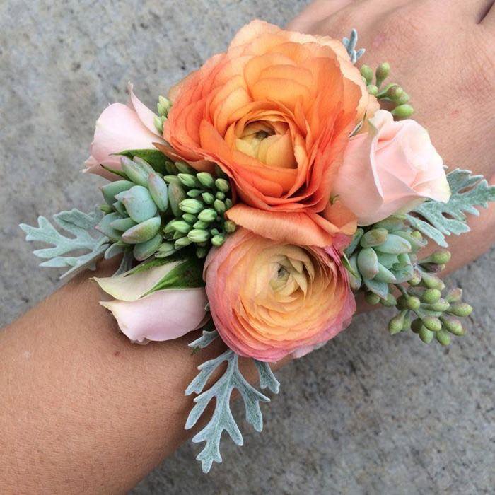 Ranunculus Mix Corsage - Ranunculus, spray roses, succulents and dusty miller as filler.  Color of flower can be change to request of customer.