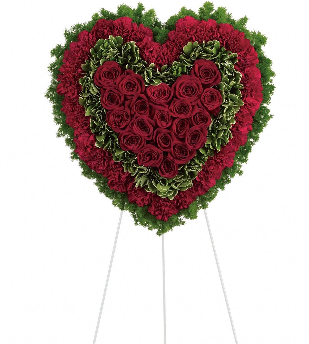 Majestic Heart - Remember a loved one's generous heart with this red arrangement in a classic heart shape, a declaration of eternal love and devotion. 
